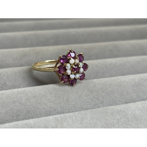 33 - 9ct Yellow Gold Garnet & Opal Flower Style Cluster Ring Weighing 2.5 grams Size N