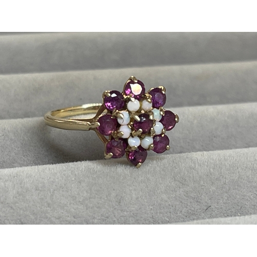 33 - 9ct Yellow Gold Garnet & Opal Flower Style Cluster Ring Weighing 2.5 grams Size N