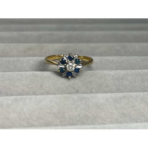 34 - 18ct Yellow Gold Fully Hallmarked Blue Stone & Diamond Cluster Ring Weighing 3.57 Grams Size N