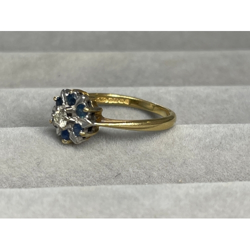 34 - 18ct Yellow Gold Fully Hallmarked Blue Stone & Diamond Cluster Ring Weighing 3.57 Grams Size N