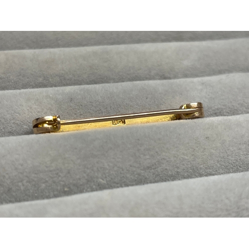 37 - 9ct Rose Gold Hallmarked Bar Brooch Featuring Three Pearls Weighing 2.77 grams