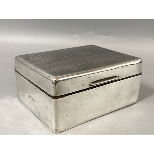 110 - Silver cased wooden box hallmarked Birmingham with unknown date, weight 290 grams