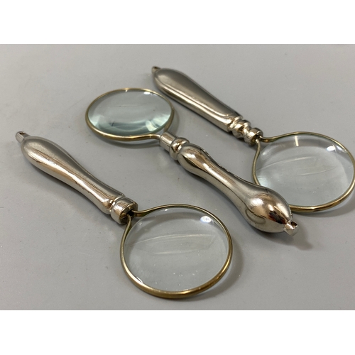 188 - A set of three miniature magnifying glasses