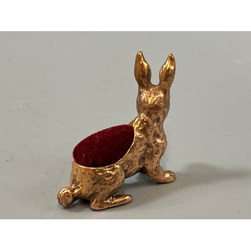 190 - Silver brass cased rabbit pincushion