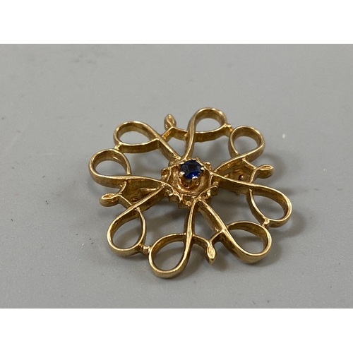 58 - 9ct gold and sapphire brooch with Fancy design, weight 2.32 grams