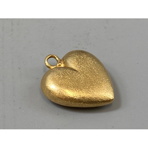 59 - 9ct heart shaped charm, weight 2 grams