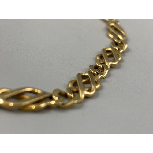 61 - 9ct gold fancy link bracelet, weight 8.2 grams 20cm length