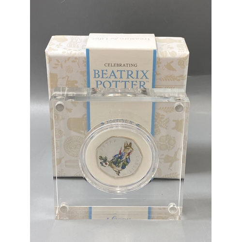 80 - Celebrating Beatrix Potter and her little tales Royal Mint 50p coin of Peter Rabbit in protective ca... 