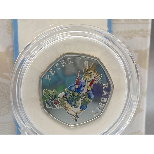 80 - Celebrating Beatrix Potter and her little tales Royal Mint 50p coin of Peter Rabbit in protective ca... 