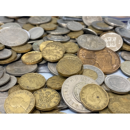 128 - Large amount of varpus coins to include Three pence, Half crown and Canadian Dollar