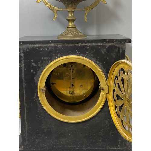 100 - French well designed black marble, granite and brass mantle clock