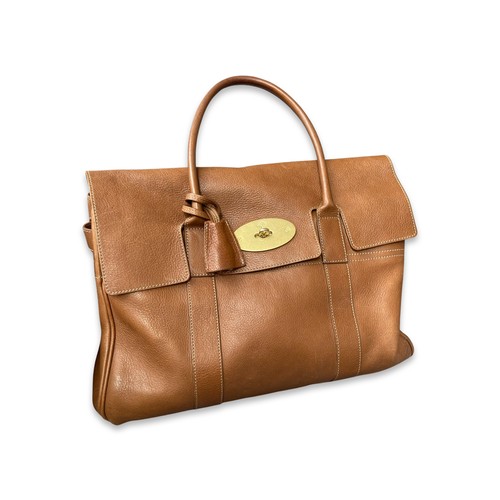 133 - Mulberry Bayswater Bag Featuring oak-textured leather in tan, two rolled carry handles lines in tan ... 