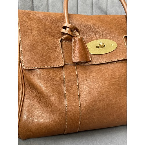 133 - Mulberry Bayswater Bag Featuring oak-textured leather in tan, two rolled carry handles lines in tan ... 