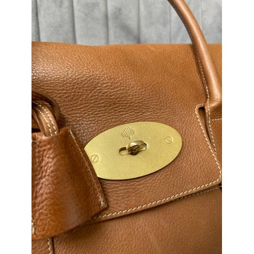 133 - Mulberry Bayswater Bag Featuring oak-textured leather in tan, two rolled carry handles lines in tan ... 