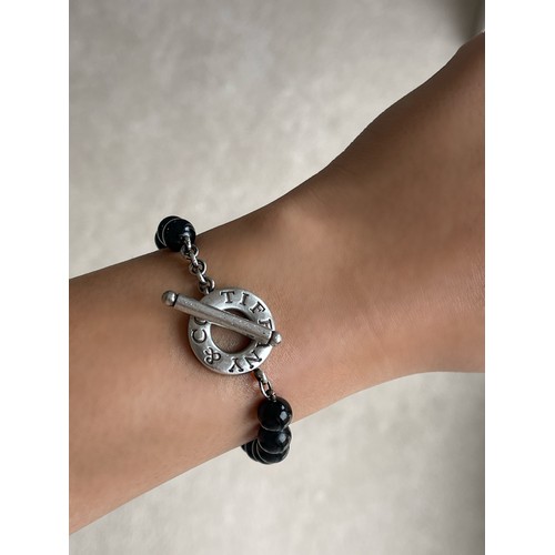 12 - Tiffany & Co. Black Onyx Beaded Bracelet with Silver Clasp in original box weighing 23.75 grams and ... 