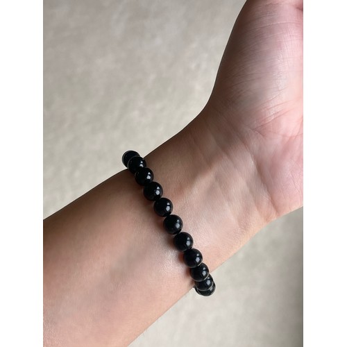 12 - Tiffany & Co. Black Onyx Beaded Bracelet with Silver Clasp in original box weighing 23.75 grams and ... 