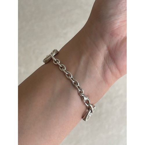 29 - Gucci Silver Double G Logo Bracelet weighing 48.37 grams and measuring 19cm