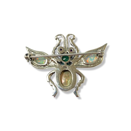 57 - Silver bug brooch comprising of multiple stones throughout including opals weighing 7.87 grams

meas... 