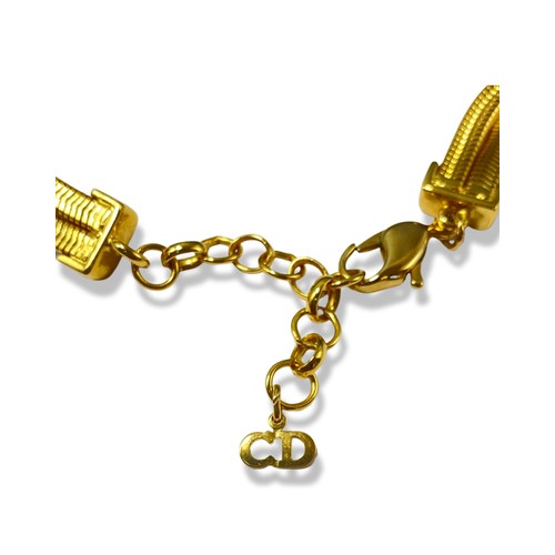 7 - Christian Dior Gold Tone Knot Design necklace weighing 59.05 grams and measuring 46cm in length, com... 