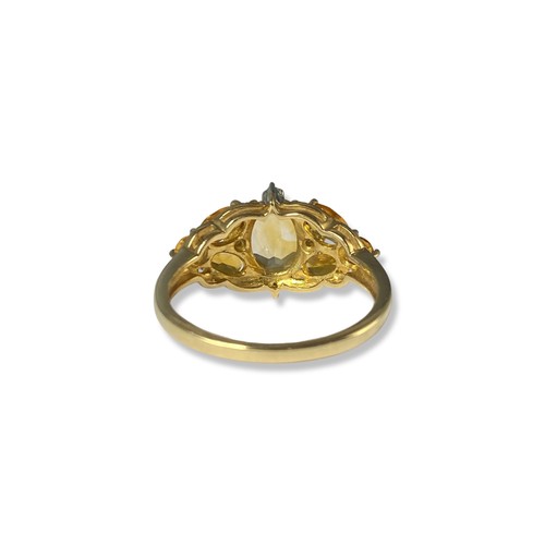 69 - 9ct yellow gold citrine and diamond ring weighing 2.98 grams size P