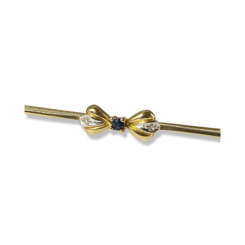 78 - 9ct Gold Chester 1986 diamond and sapphire bow bar brooch weighing 7.93 grams and a length of 5cm