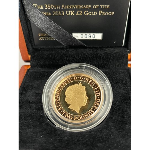 117 - Royal Mint The 350th Anniversary of the Guinea 2013 UK £2 Gold Proof Coin, complete with case and ce... 