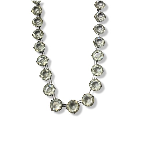 14 - An Art Deco Silver Paste Rivere Necklace weighing 24.68 grams measuring 36.5cm in length