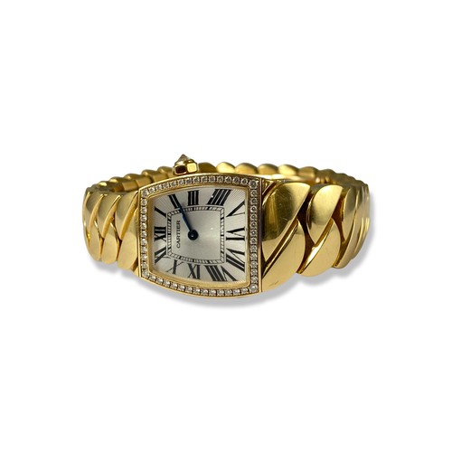 101 - Cartier 18ct Yellow Gold La Dona de Cartier Wristwatch full set. This watch features a silver dial w... 