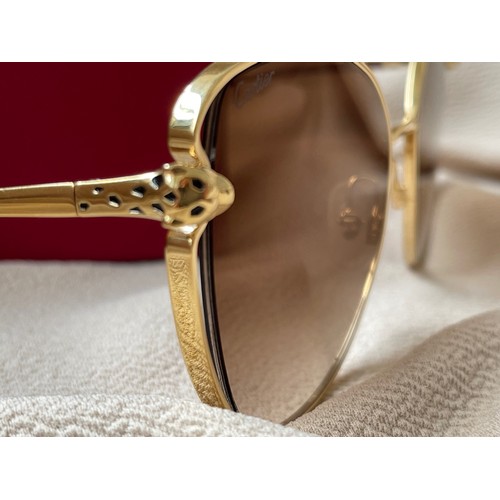 45 - Cartier Cat Eye Shaped Sunglasses from their Panthere Collection complete with box and papers.