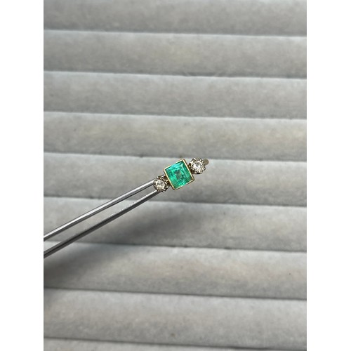 84 - 18ct Yellow and white gold emerald and diamond trilogy ring comprising of a square cut emerald weigh... 