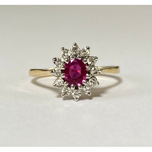 86 - 14ct Yellow gold Ruby and Diamond cluster ring featuring an oval ruby stone weighing approximately 0... 