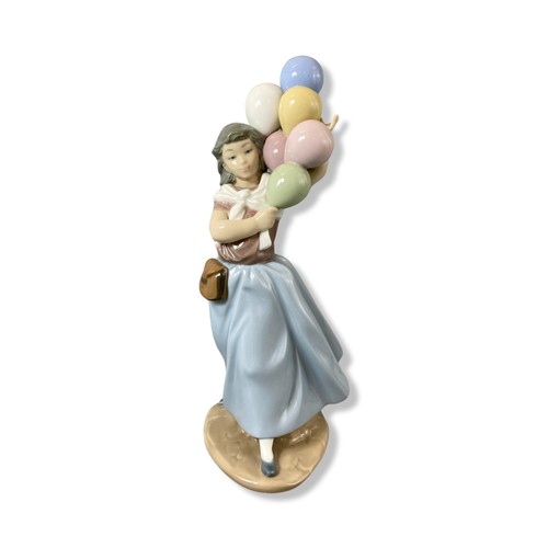 89 - Lladro Signed and dated 5141 Balloon Seller, Good condition, comes in box