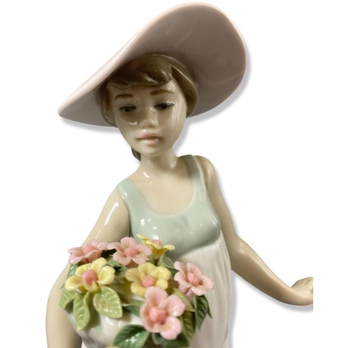 158 - Lladro Signed and dated 5790 Carefree, comes in box, two petals missing
