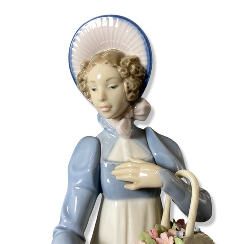 189 - Lladro 6427 A flower for you, comes in box slight damage to a flower