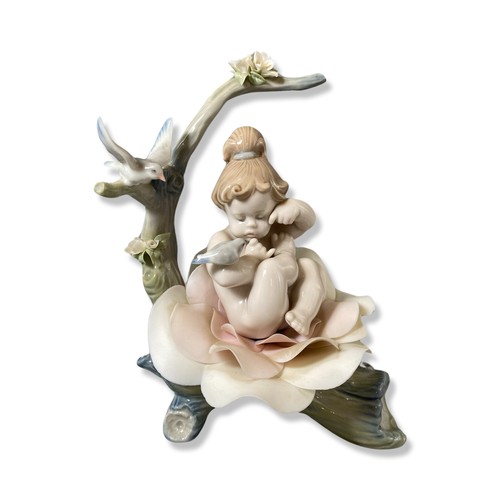 176 - Lladro Signed and dated 6920 Born in springtime, Comes in box, has some damage to one petal