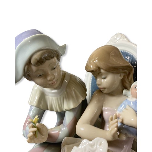 191 - Lladro Signed and dated 5844 Flirtatious Jester, one petal slightly damaged, comes in box