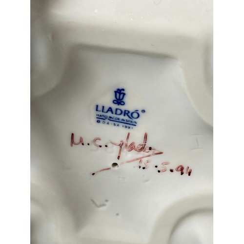 191 - Lladro Signed and dated 5844 Flirtatious Jester, one petal slightly damaged, comes in box