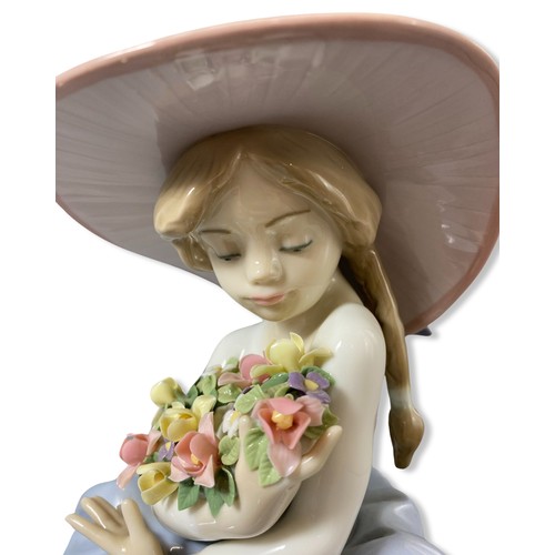 185 - Lladro Signed and dated 5862 Fragrant Bouquet, Comes in box, has two petals which are slightly damag... 