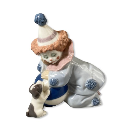 133 - Lladro Signed and dated 5278 Pierrot with puppy and ball, Good condition, comes in box