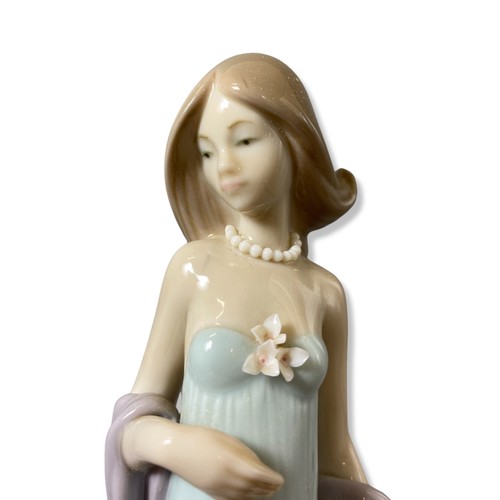 150 - Lladro 5487 Ingenue, with slight petal damage, comes in box