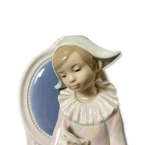 202 - Lladro Signed and dated 1229 Young Harlequin, Good condition, comes in box