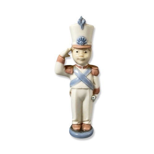 254 - Selection of Lladro decorations including two kinds, a jester & a solider