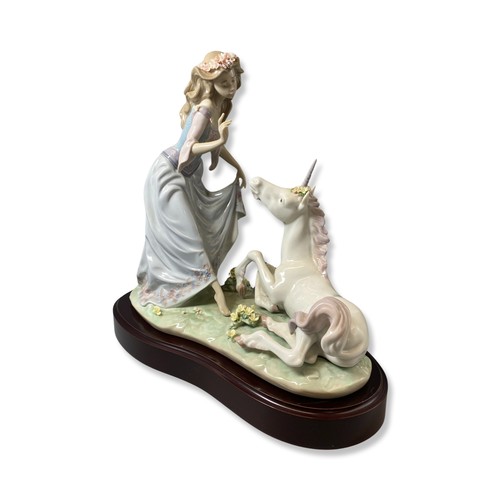 104 - Lladro 1755 Signed and dated The Princess and the unicorn Good condition comes in original box with ... 