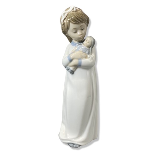 67 - X3 Nao by Lladro figurines to include we're sleepy, ready for bed and girl with doll all in good con... 