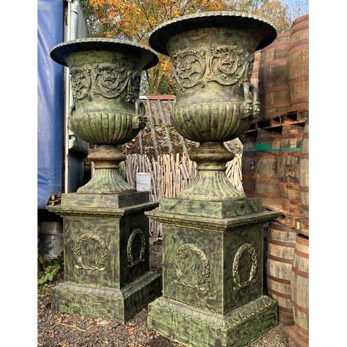 62 - 2.8M HIGH HUGE PAIR EXCEPTIONAL CAST IRON MONUMENTAL CAMPANA STYLE URNS ON PLINTH, IN THE MANNER OF ... 