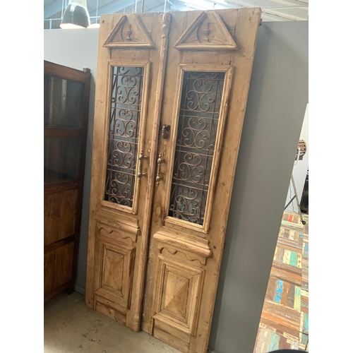 33 - EXCEPTIONAL PAIR ANTIQUE STRIPPED EGYPTIAN ORNATE DOORS WITH IRONWORK 250CM X 120CM