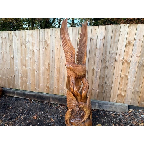 169 - STRIKING HANDCARVED HIGHLY POLISHED 2M HIGH WOODEN DETAILED EAGLE IN MOTION