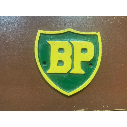 141 - CAST IRON BP SHIELD SIGN