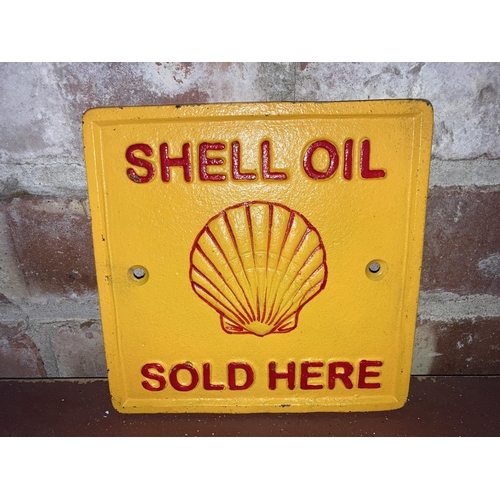 151 - CAST IRON SQUARE SHELL OIL SOLD HERE SIGN