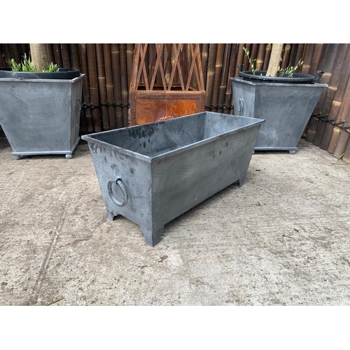 102 - 1 X CLASSIC ORNATE STEEL PLANTER ON LEGS WITH SIDE HANDLES IN LEAD FINISH (80CM X 36CM X 35CM)